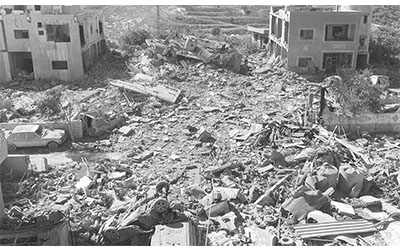 حارة مدمرة في إحدى قرى الشريط الحدودي، المصدر: الحرة